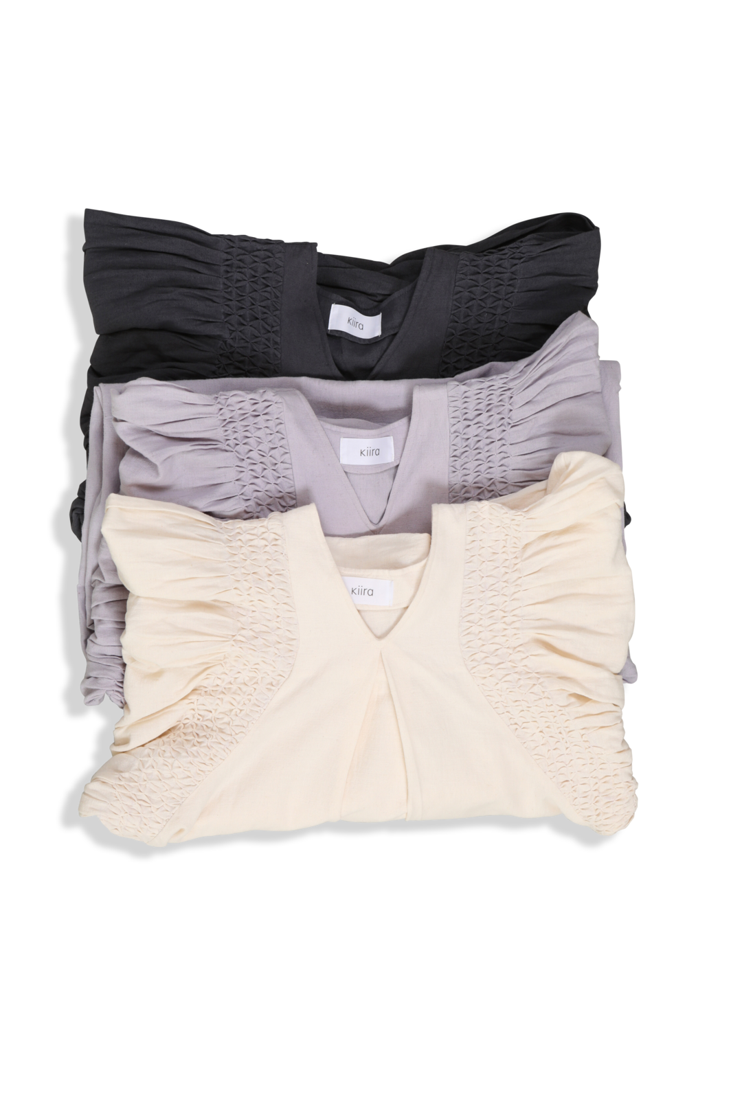 Poupons Kiira Smocking Tuck Op Poupons Kiira Smocking Tuck Op